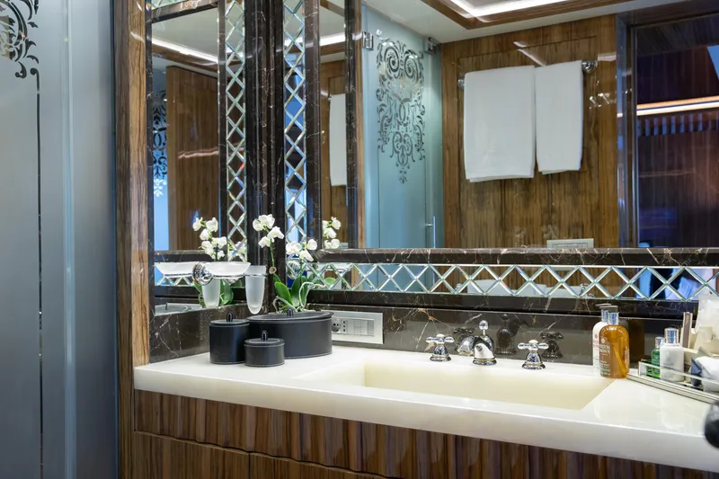Okko Yacht Photos Pics Luxurious bathroom on 2013 Mondomarine 41M yacht with elegant fixtures and decor.