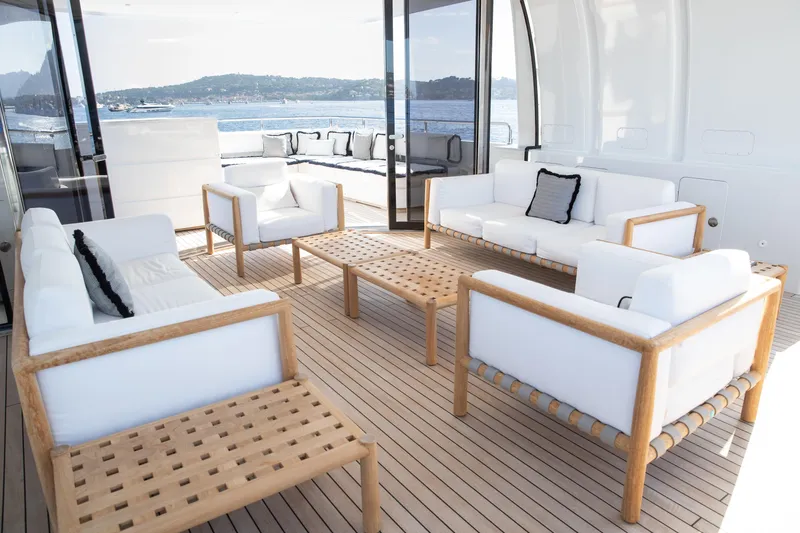 Okko Yacht Photos Pics Luxurious Mondomarine 41M yacht deck with elegant seating, 2013 model, scenic ocean view.