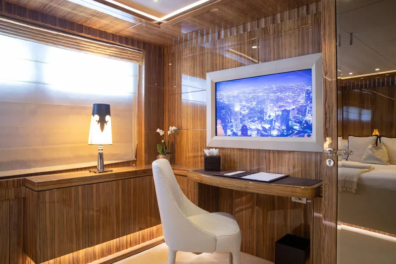 Okko Yacht Photos Pics Luxurious Mondomarine 41M yacht interior, featuring elegant wood paneling and modern decor, 2013 model.