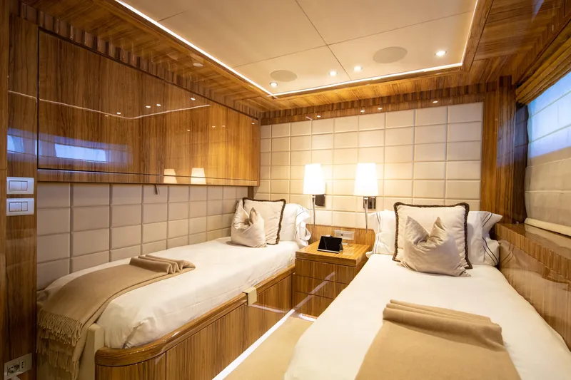 Okko Yacht Photos Pics Luxurious twin cabin interior on 2013 Mondomarine 41M yacht, featuring elegant wood finishes.