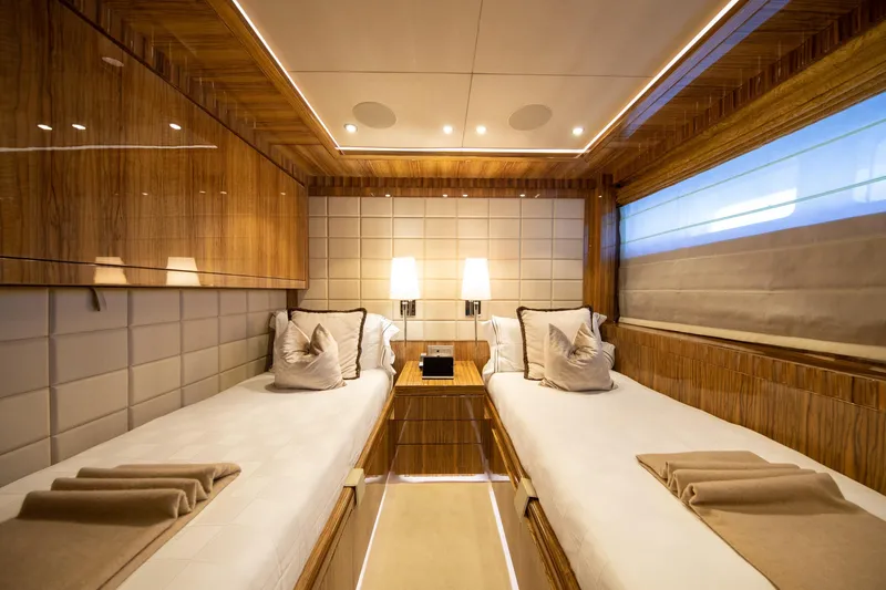 Okko Yacht Photos Pics Luxurious twin cabin interior on 2013 Mondomarine 41M yacht, featuring elegant wood finishes.