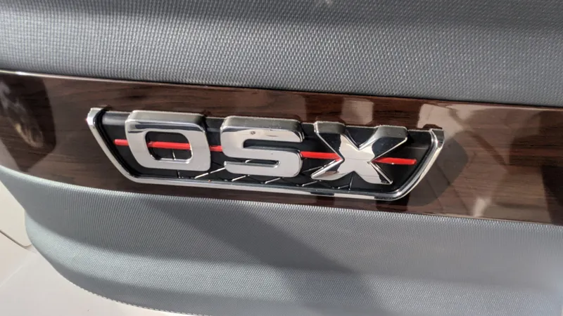  Yacht Photos Pics 2020 Chaparral 280 OSX logo on a sleek, modern surface.