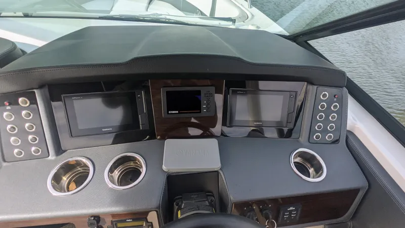  Yacht Photos Pics Dashboard of 2020 Chaparral 280 OSX boat with modern controls and displays.