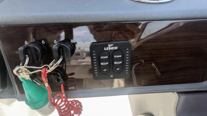  Yacht Photos Pics Control panel of 2020 Chaparral 280 OSX boat with Lenco trim tab switches.