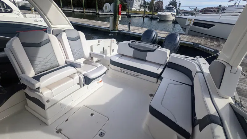  Yacht Photos Pics 2020 Chaparral 280 OSX boat interior with luxurious seating and modern design.