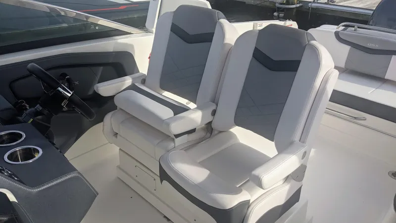  Yacht Photos Pics 2020 Chaparral 280 OSX boat interior with dual gray and white captain seats.