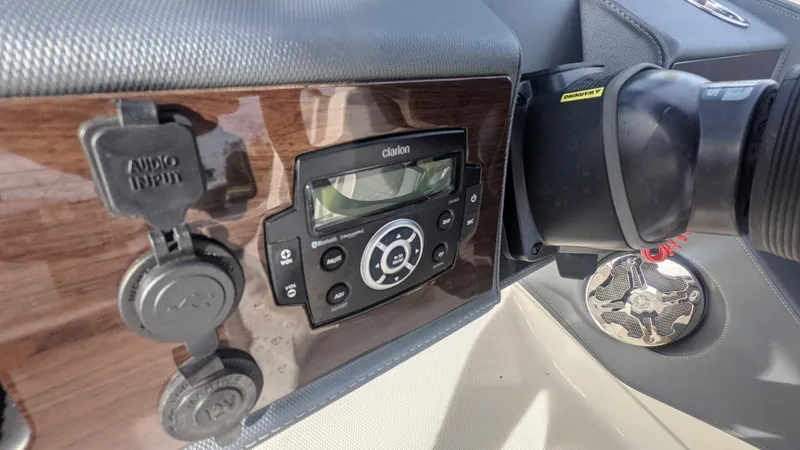  Yacht Photos Pics Dashboard of 2020 Chaparral 280 OSX with audio controls and input ports.
