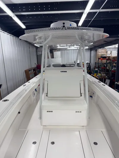  Yacht Photos Pics 2022 Contender 32 ST boat interior in a storage facility.