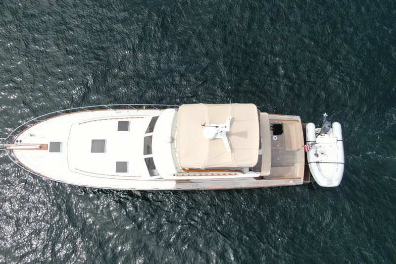 Minkie B Yacht Photos Pics Aerial view of 1997 Lyman-Morse Custom Flybridge yacht on open water.