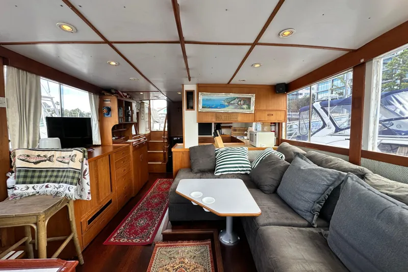 Maren Yacht Photos Pics Interior of 1980 Island Gypsy Flush Aft Deck Trawler-Motor Yacht with cozy seating and decor.