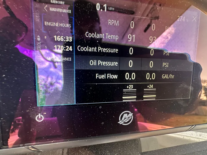  Yacht Photos Pics Dashboard display of a 2013 Boston Whaler 320 Outrage showing engine metrics and maintenance data.