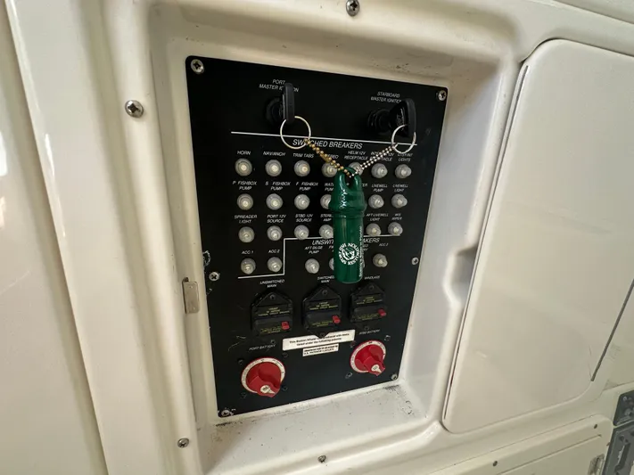  Yacht Photos Pics Control panel of a 2013 Boston Whaler 320 Outrage boat with switches and breakers.