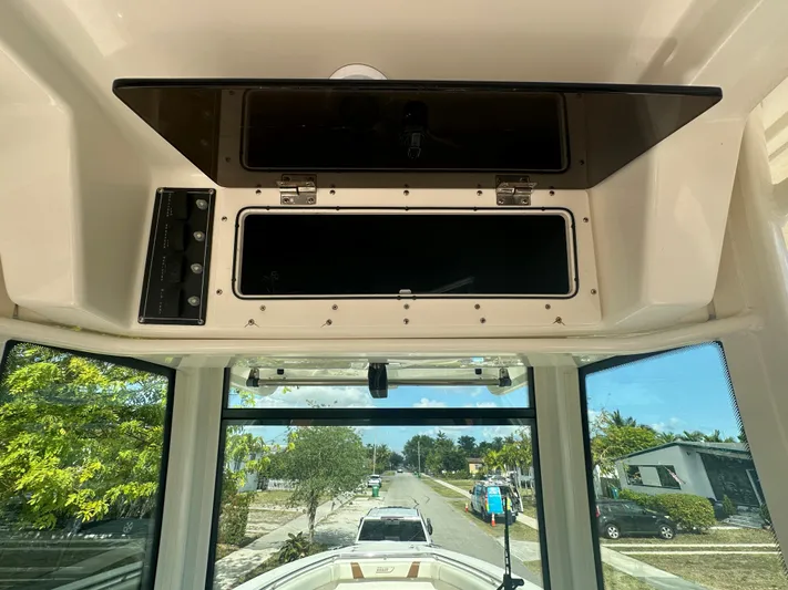  Yacht Photos Pics Interior view of a 2013 Boston Whaler 320 Outrage boat console.