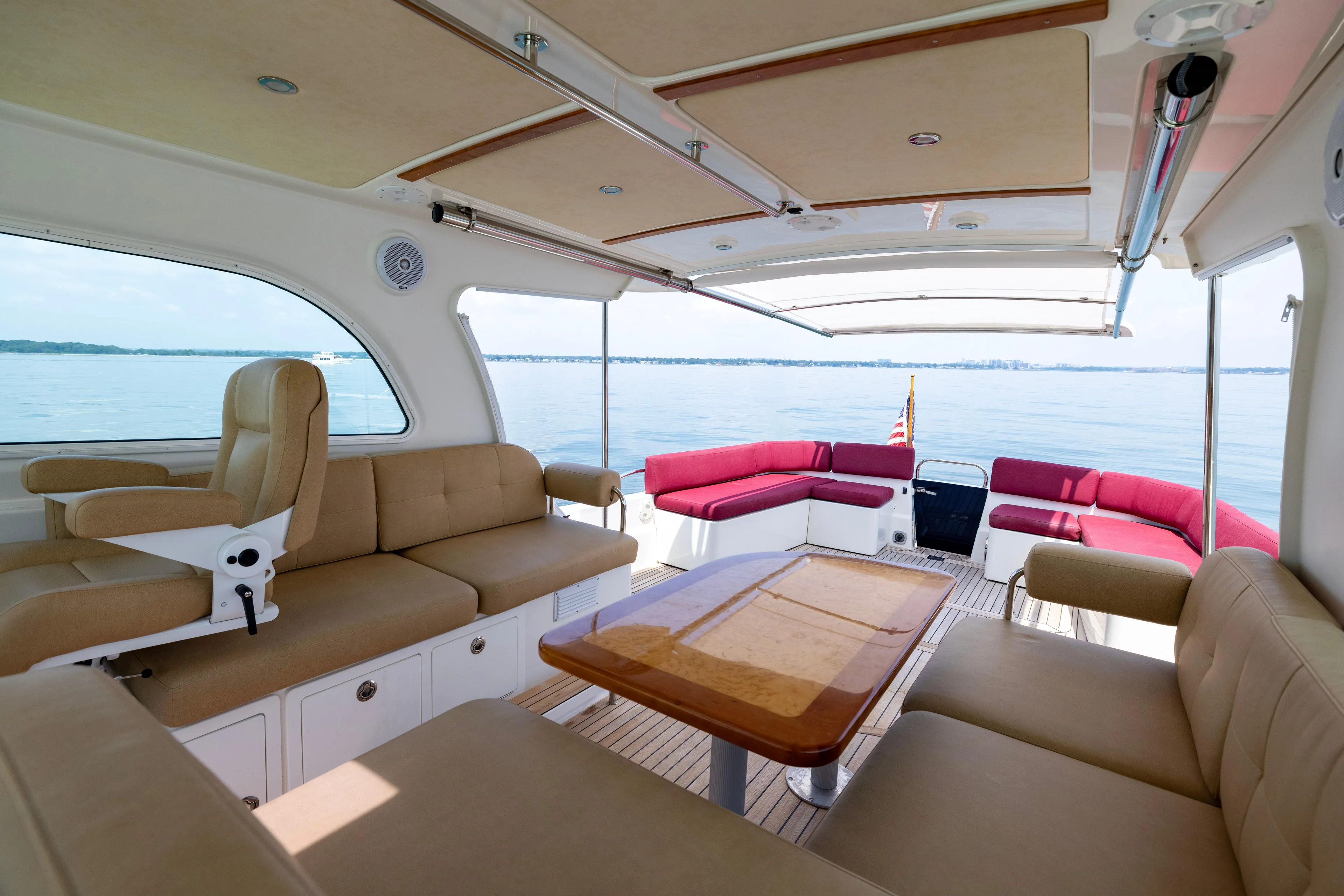 Waters Edge Yacht Photos Pics Luxurious interior of 2018 Back Cove Downeast 37 yacht with spacious seating and scenic ocean view.