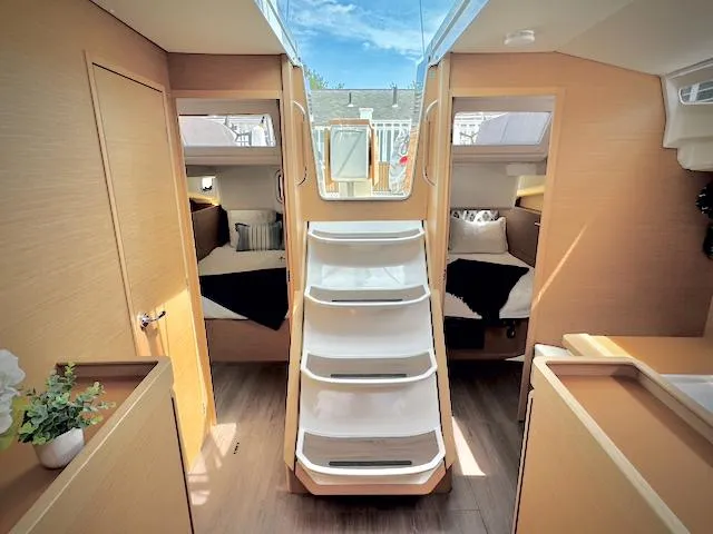 In Stock 440 #442 Yacht Photos Pics Interior of 2023 Jeanneau Sun Odyssey 440 sailboat, featuring modern design and twin cabins.