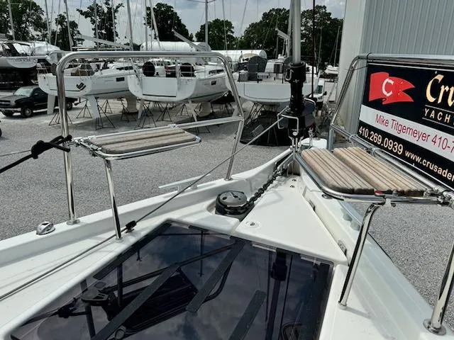 In Stock 440 #442 Yacht Photos Pics 2023 Jeanneau Sun Odyssey 440 yacht deck at marina, showcasing sleek design and modern features.