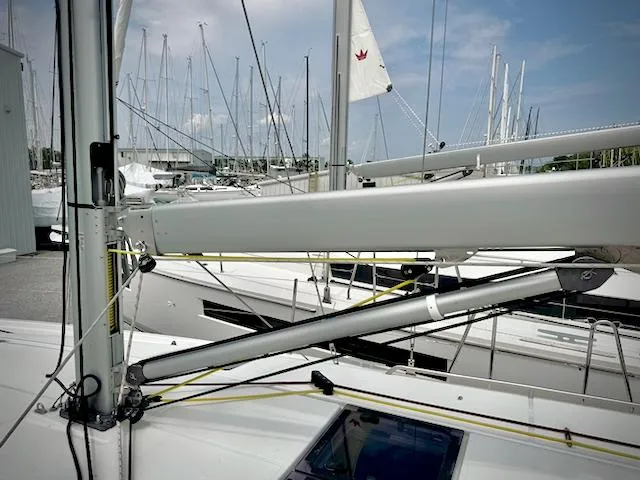 In Stock 440 #442 Yacht Photos Pics 2023 Jeanneau Sun Odyssey 440 sailboat mast and rigging in marina.