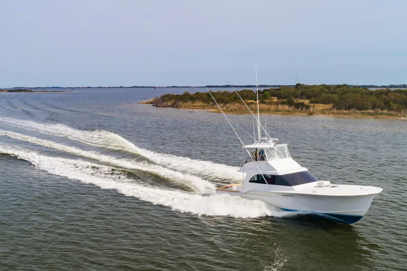 Fish Repellent Yacht Photos Pics Jarrett Bay 54 Convertible yacht cruising on open water, 2000 model.