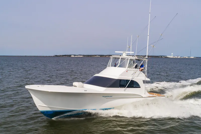 Fish Repellent Yacht Photos Pics 2000 Jarrett Bay 54 Convertible yacht cruising on open water.