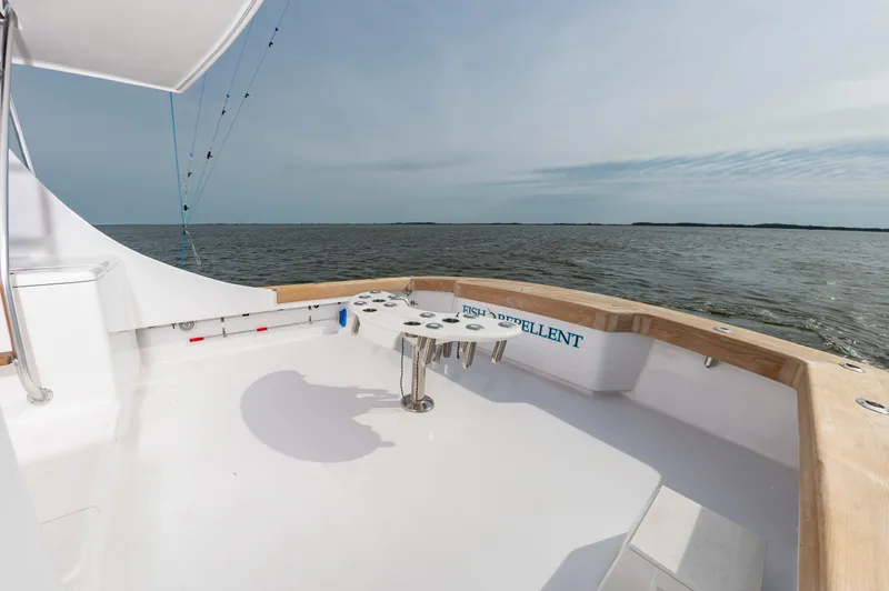 Fish Repellent Yacht Photos Pics Jarrett Bay 54 Convertible 2000 yacht deck overlooking calm ocean waters.