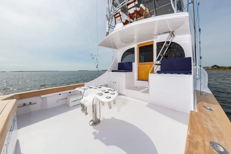 Fish Repellent Yacht Photos Pics Jarrett Bay 54 Convertible 2000 yacht deck with fishing chair, ocean view.