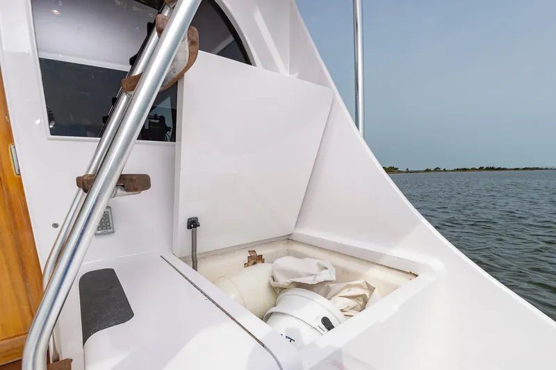 Fish Repellent Yacht Photos Pics Jarrett Bay 54 Convertible 2000 boat storage compartment with ocean view.