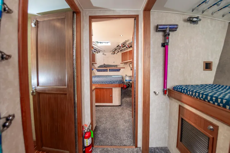 Fish Repellent Yacht Photos Pics Interior of 2000 Jarrett Bay 54 Convertible yacht with cozy cabin and modern amenities.