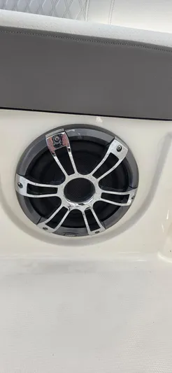  Yacht Photos Pics Speaker on 2021 Sea Ray SLX 310 Outboard boat, featuring sleek design and chrome accents.