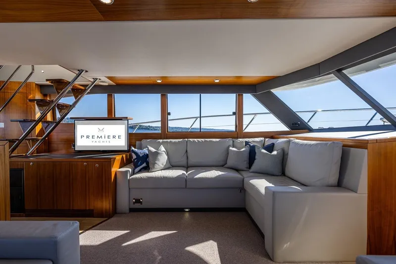 True North Yacht Photos Pics Luxurious interior of 2020 Maritimo M59 yacht with elegant seating and scenic views.