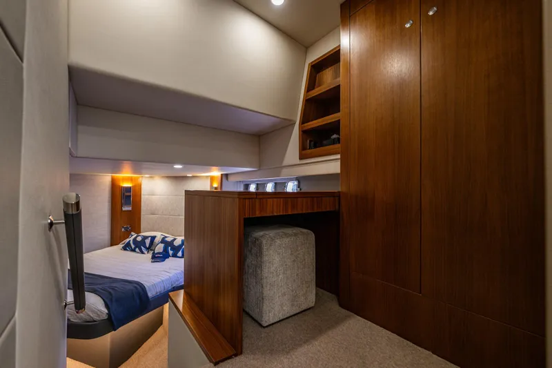 True North Yacht Photos Pics Luxurious cabin interior of 2020 Maritimo M59 yacht with elegant wood finishes.