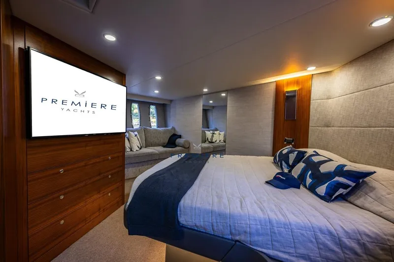 True North Yacht Photos Pics Luxurious 2020 Maritimo M59 yacht bedroom with modern decor and ambient lighting.