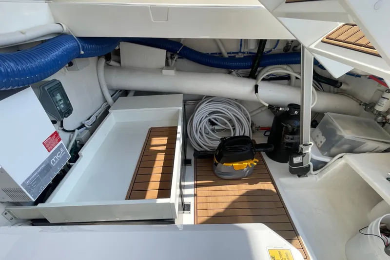 True North Yacht Photos Pics 2020 Maritimo M59 yacht engine room with equipment and storage space.