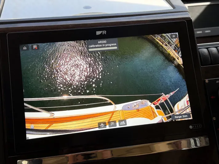  Yacht Photos Pics Display screen on 2009 Princess V65 yacht showing calibration in progress over water.