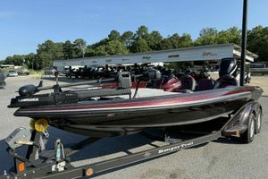 2008 Ranger Z520 Comanche boat on trailer, featuring Lowrance equipment, parked outdoors.