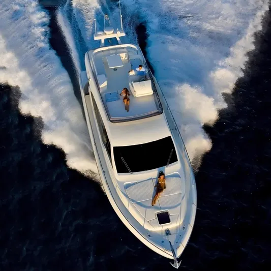  Yacht Photos Pics 2011 Ferretti Yachts 530 cruising on open water, aerial view.