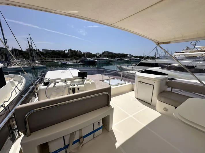  Yacht Photos Pics Luxurious 2011 Ferretti Yachts 530 docked in a sunny marina.