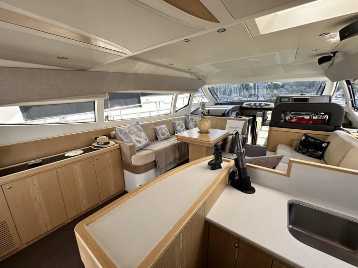  Yacht Photos Pics Luxurious interior of 2011 Ferretti Yachts 530, featuring elegant seating and modern design.
