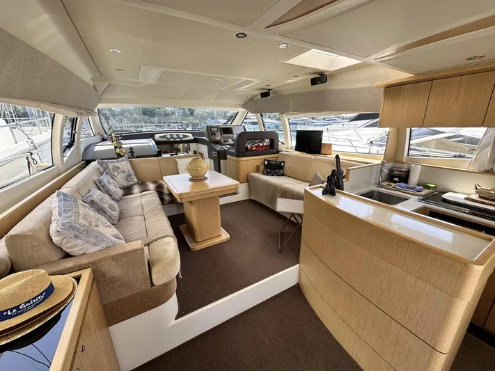  Yacht Photos Pics Luxurious interior of 2011 Ferretti Yachts 530, featuring elegant seating and modern amenities.