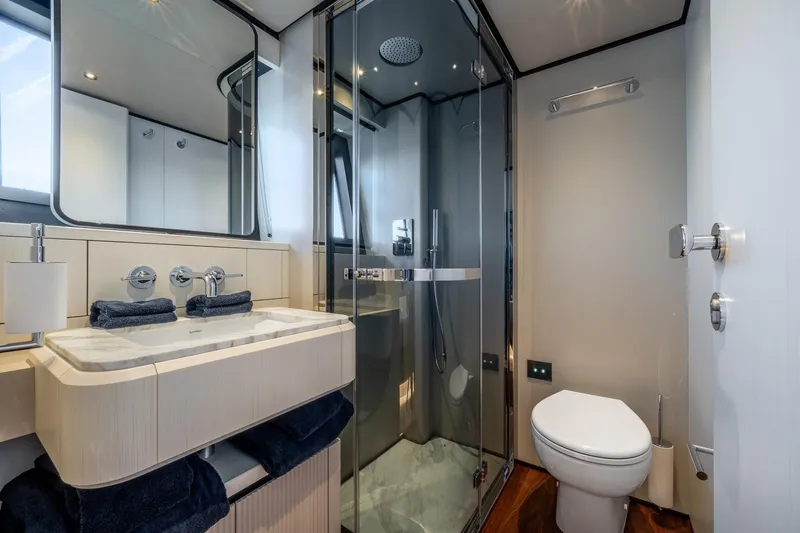 Together Yacht Photos Pics Luxurious bathroom in 2025 Ferretti Yachts 940, featuring modern fixtures and elegant design.