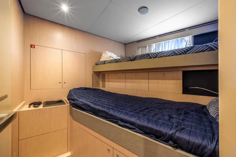 Together Yacht Photos Pics Luxurious cabin interior of 2025 Ferretti Yachts 940 with bunk beds and modern design.
