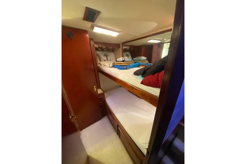 Second Chance Yacht Photos Pics Cozy cabin interior with bunk beds on a 1986 Post 46 yacht.