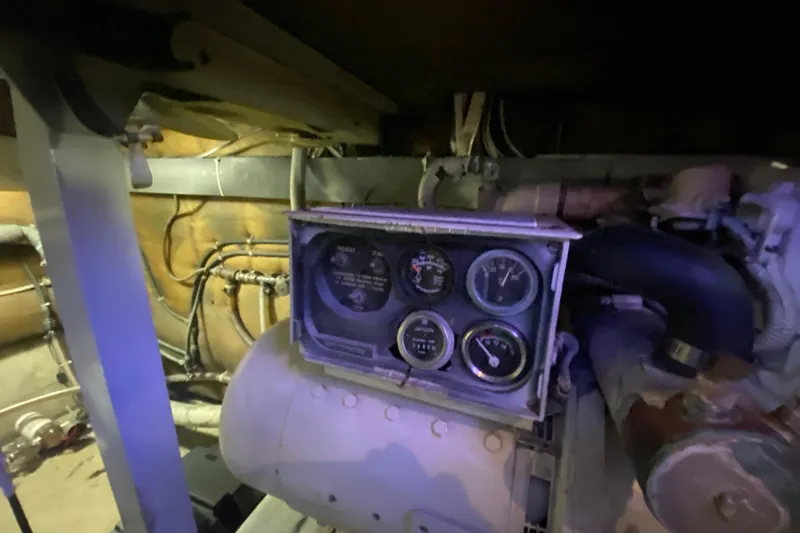 Second Chance Yacht Photos Pics Engine room of a 1986 Post 46 boat with control gauges and wiring.