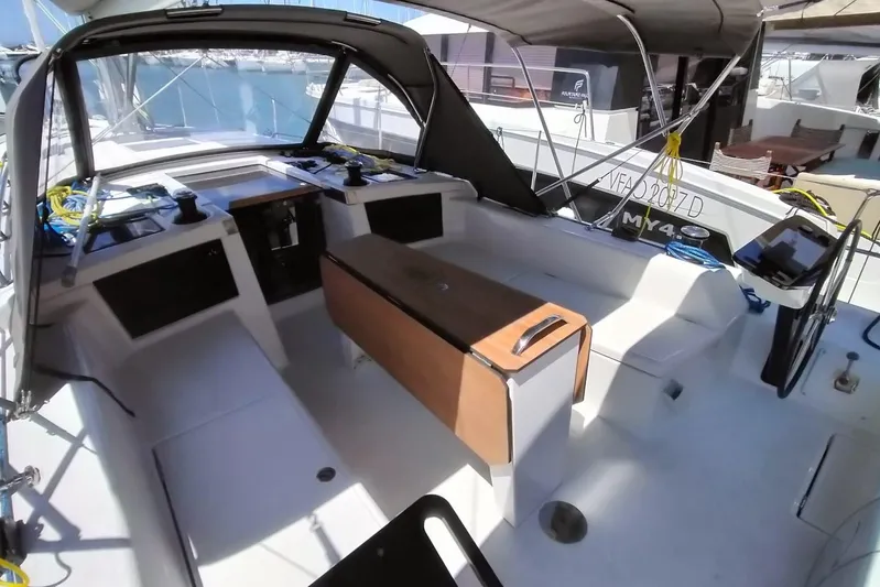  Yacht Photos Pics 2025 Dufour 41 yacht cockpit with modern design and seating area.