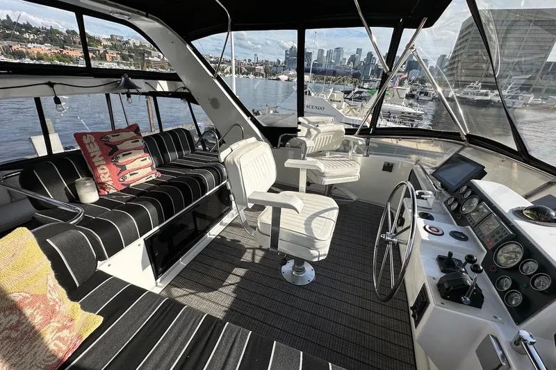 Rover Yacht Photos Pics Luxurious 1993 Ocean Alexander 460 yacht interior with plush seating and modern helm controls.