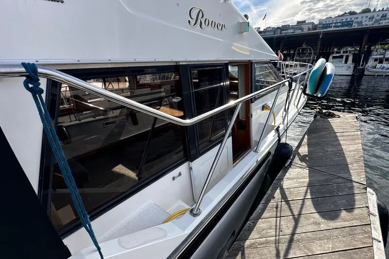 Rover Yacht Photos Pics 1993 Ocean Alexander 460 yacht docked, showcasing sleek design and waterfront setting.