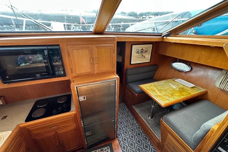 Rover Yacht Photos Pics Cozy 1993 Ocean Alexander 460 yacht interior with kitchenette and dining area.