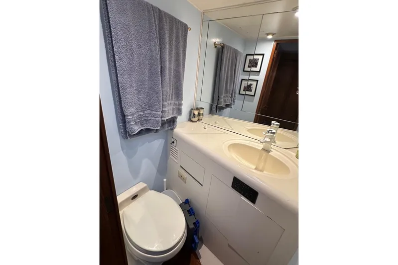 Rover Yacht Photos Pics Bathroom interior of 1993 Ocean Alexander 460 yacht with mirror and towel.