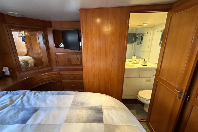 Rover Yacht Photos Pics Cozy cabin interior of 1993 Ocean Alexander 460 yacht with ensuite bathroom.