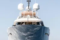 Front view of a 2012 ISA Custom yacht on calm sea.