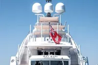 Luxury ISA Custom yacht, 2012 model, with elegant design and multiple decks, sailing on open water.